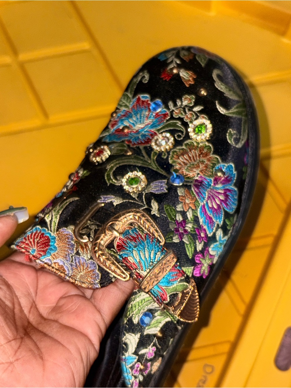 L’artiste and azalea wang collab Black Floral Slip-On Mule with Gold Buckle.